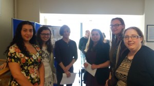 UWTSD students that worked with the objects from the Cyfarthfa Castle Museums and Art Gallery, at the exhibition in the UWTSD Roderic Bowen Library and Archives.
