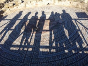 Paphos Mosaics 09/07/2016. Paul Croft and the LARC Group silhouetted against Mosaic at Palace in Paphos. Roman Period. (c) Charlie Kerslake.